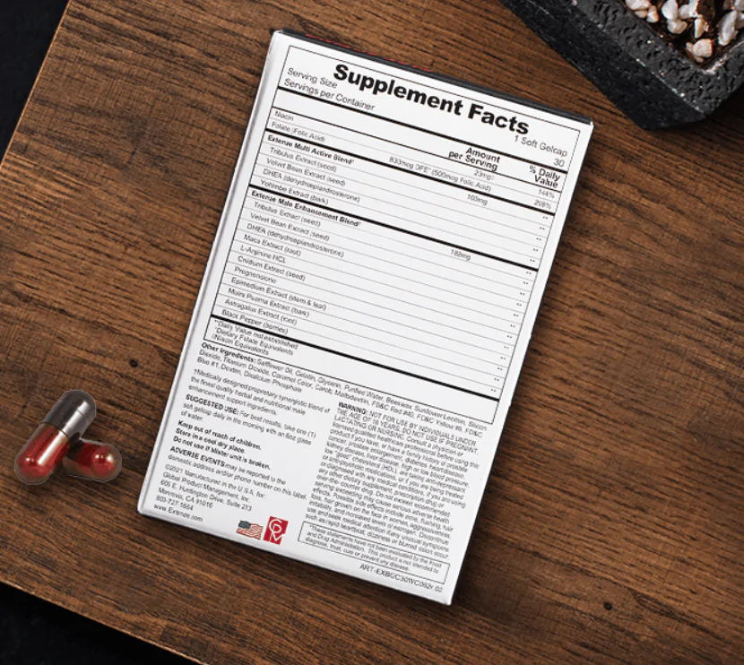 Scientific beakers and herbal ingredients on table